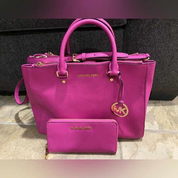 Michael Kors fuschia large satchel with matching wallet